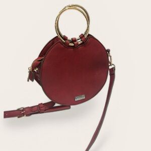 Carlos Santana faux pebbled leather maroon western crossbody bag laser cut rings
